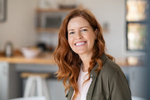 smiling woman with red hair